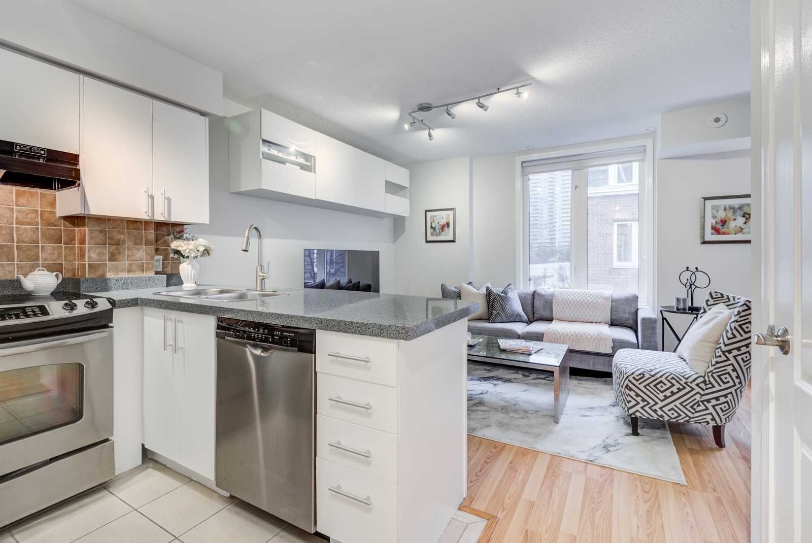 Toronto Townhouse Condo For Sale: Live in the Heart of King West Without the Million-Dollar Price Tag 5 kitchen living room townhouse condo for sale