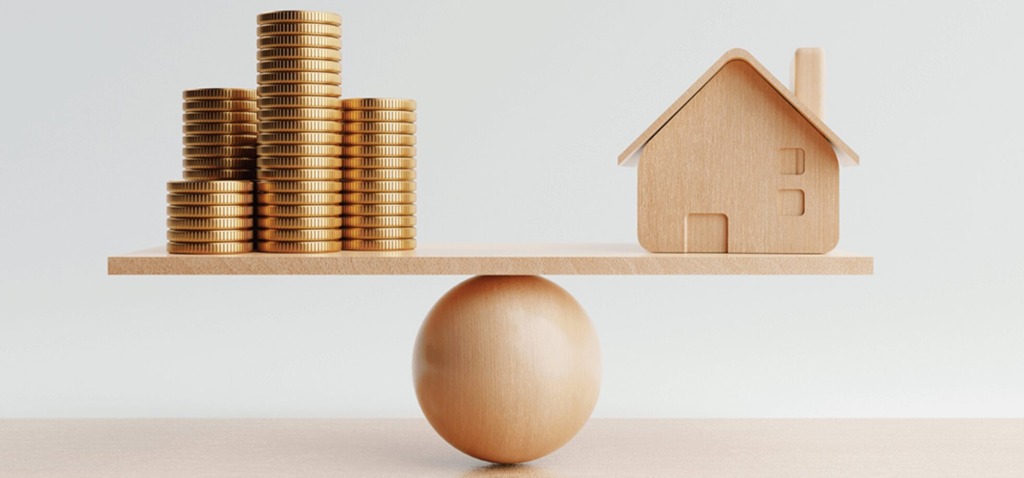 Toronto real estate balancing act scale